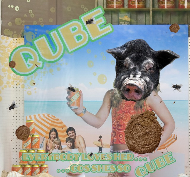 Qube - Ad with pig's head and poo!