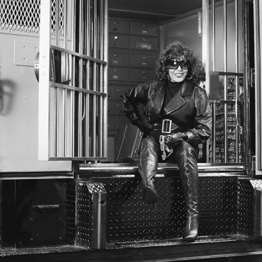 Joan Collins on set