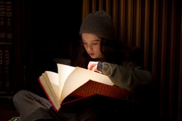 Molly discovers the book Hypnotism an Ancient Art Explained - still from movie